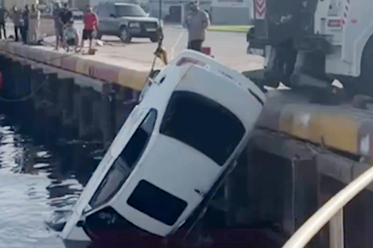 When a Car in Jaddaf Falls off a Pier, Two Young Men Escape Death