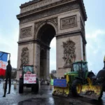 1767866162French_farmers_drive_tractors_into_Paris_to_protest_South_America_trade_deal