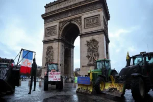 1767866162French_farmers_drive_tractors_into_Paris_to_protest_South_America_trade_deal