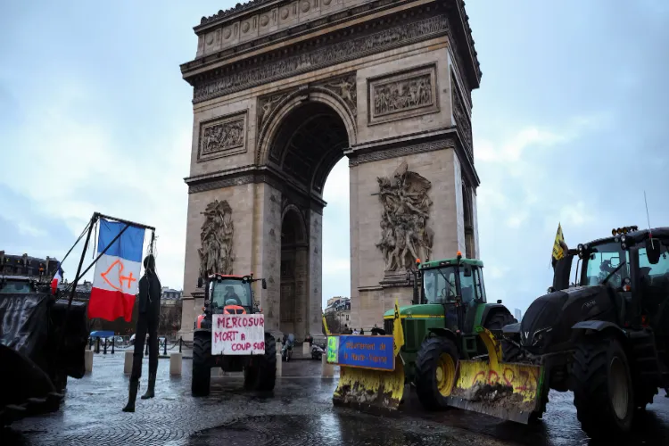 1767866162French_farmers_drive_tractors_into_Paris_to_protest_South_America_trade_deal